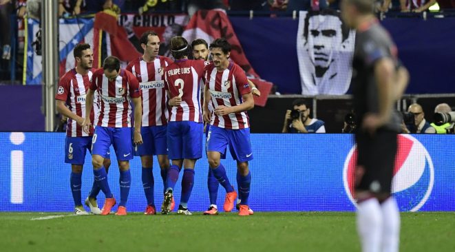 The team celebrates Carrasco's goal