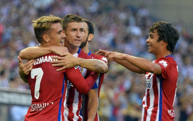 Griezmann celebrates after scoring a free-kick